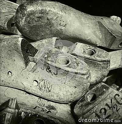 Antique wooden shoe lasts with makers marks and sizes Stock Photo