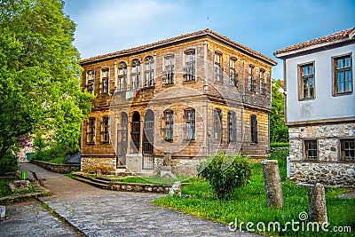 Antique wooden two story house in Malko Tarnovo Editorial Stock Photo