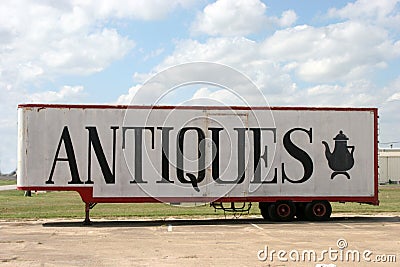 Antiques Sign on Side of Trailer Stock Photo