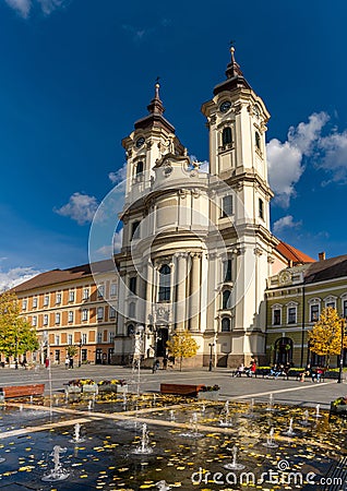 The Antony of Padua Church in Eger and fountain with autumn color trees and leaves Editorial Stock Photo