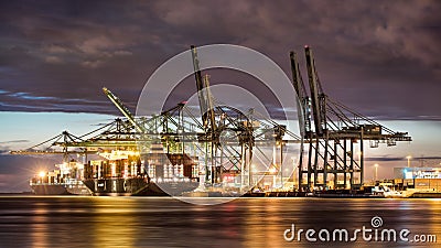 Illuminated container terminal at night, Port of Antwerp, Belgium Editorial Stock Photo