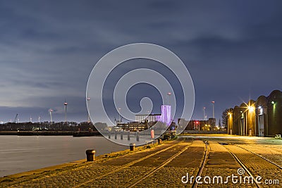Antwerp, Belgium - February 5, 2020: View of the river Scheldt near the Waagnatie silos in the old harbor. Editorial Stock Photo