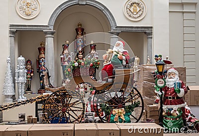 Santa Claus and carriage display in Christmas store, Antwerp Belgium. Editorial Stock Photo