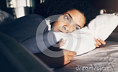 Anxiety, depression and sad woman tired in bed with insomnia, thinking and trying to sleep while sick. Morning, sunrise Stock Photo