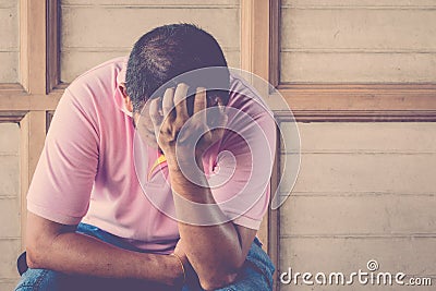 Anxious man feeling sadness Stock Photo