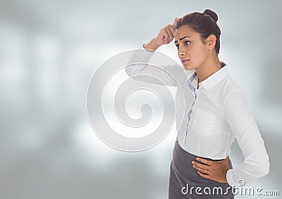 Anxious worried woman against blurred background Stock Photo