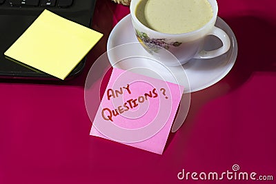 Any Questions?, Business Concept, Hand writing Any Questions with Red marker on Cardboard wipe board isolated on Red Stock Photo