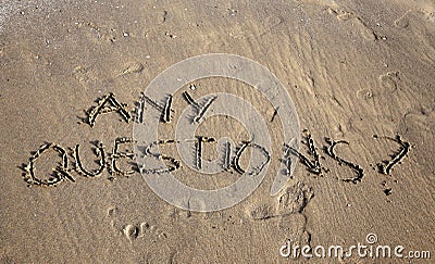 Any Questions writing on the beach Stock Photo