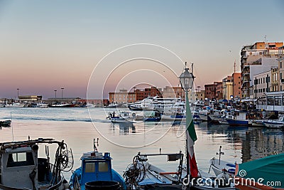 Anzio, Lazio region, Italy - August 27, 2018: Small picturesque city port at sunset Editorial Stock Photo