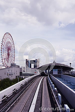 Aomi station. Scenery of a train traveling on the elevated rail of Yurikamome Line in Tokyo Editorial Stock Photo