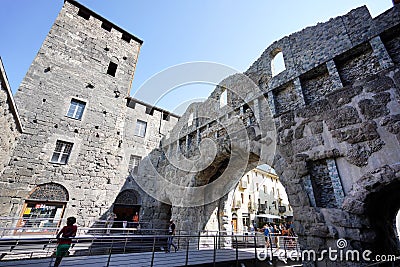 AOSTA, ITALY - AUGUST 20, 2021: roman ruins Porta Praetoria gate in Aosta city, northern Italy Editorial Stock Photo