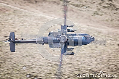 Apache helicopter in flight Stock Photo