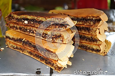 Apam balik ,also known as terang bulan , martabak manis (sweet martabak). Stock Photo