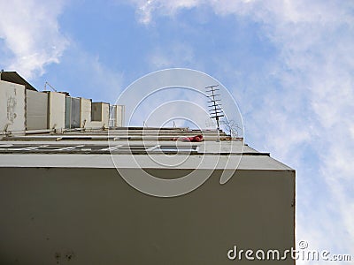 Apartment block and antenna Stock Photo