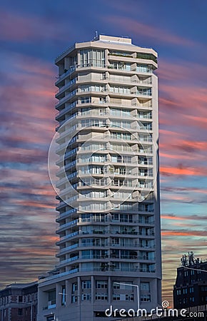 Apartment block in Sydney NSW Australia at sunset vivid multi colours Editorial Stock Photo