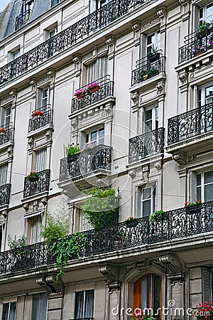 Apartment building with ornate 19th century architecture typical of central Paris Stock Photo