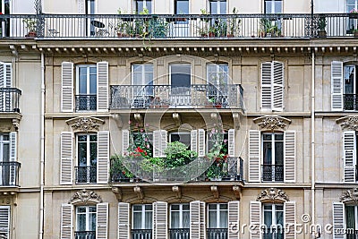 Apartment building with ornate 19th century architecture typical of central Paris Stock Photo