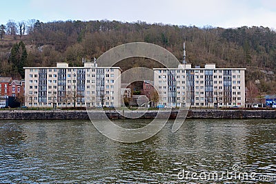 Apartment buildings bank Meuse, Leffe, Dinant, Belgium Stock Photo