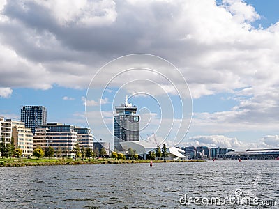Apartment buildings, Eye film museum and Adam Tower on north bank of IJ river in Amsterdam, Netherlands Editorial Stock Photo