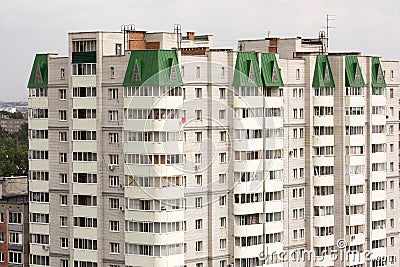 Apartment house with a green roof Stock Photo