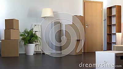 Apartment set with cardboard boxes, moving to new house, relocation service Stock Photo