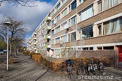 Apartments in residential district Dutch city Utrecht with parked bicycles Editorial Stock Photo