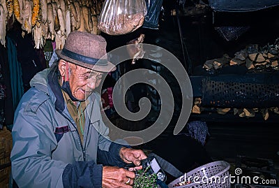 Apatani tribal men facial expression at his home with blurred background Stock Photo