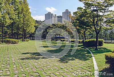 APEC Naru park pavement made of stone blocks and green grass Stock Photo