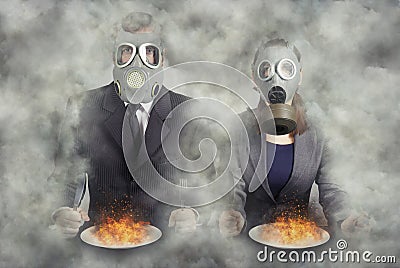 Apocalypse. A pair of gas masks at dinner Stock Photo