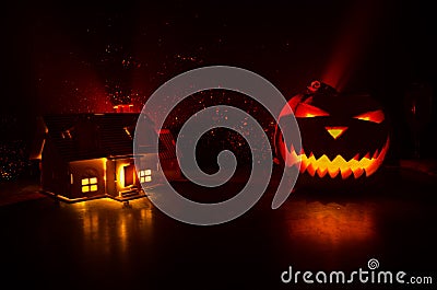 Apocalyptic Halloween scenery with old house pumpkin. Horror zombie near the abandoned house. Halloween. Stock Photo