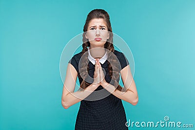 Apologize woman looking at camera and hope. Stock Photo