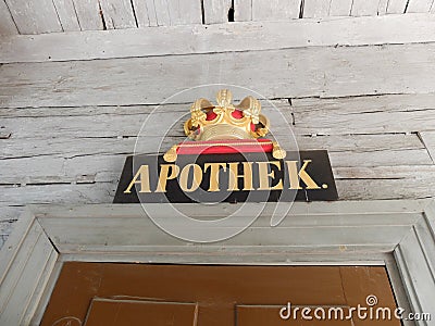 Apothek, apothecary sign above the entrance of a healthcare store, ancient pharmacy, Skansen Editorial Stock Photo