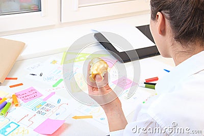 App developer snacking apple Stock Photo