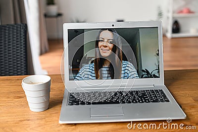 Video meeting on laptop screen, zoom app Stock Photo