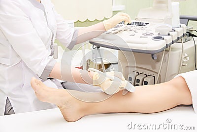 Apparatus ultrasound examination. Doctors work. Patients foot. Medical research Stock Photo