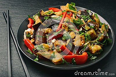 Appetizer - asian salad with eggplants, paprika and garlic . Stock Photo