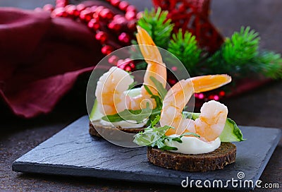 Appetizer canape with arugula and shrimp Stock Photo