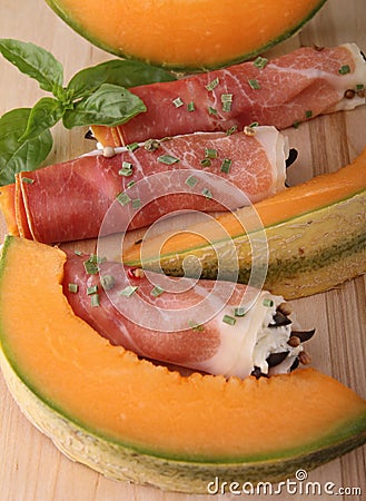 Appetizer, melon and cured ham Stock Photo