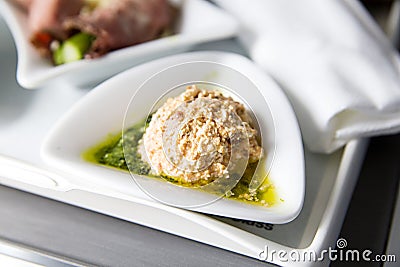 Appetizer on the plate in airplane Stock Photo