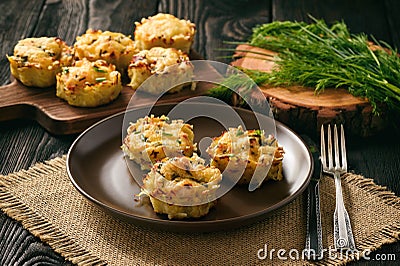 Appetizer - potato muffins with chicken meat and cheese. Stock Photo