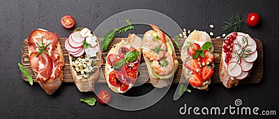 Appetizers board with traditional spanish tapas set. Italian antipasti brushetta snacks Stock Photo