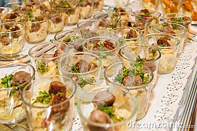 Appetizers in small glasses in rows Stock Photo