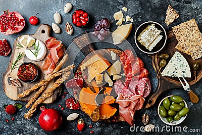 Appetizers table with italian antipasti snacks. Brushetta or authentic traditional spanish tapas set, cheese variety board Stock Photo