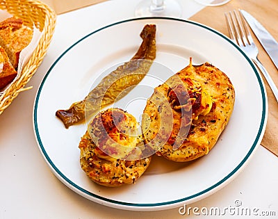 Appetizing stuffed potatoes with boiled egg Stock Photo