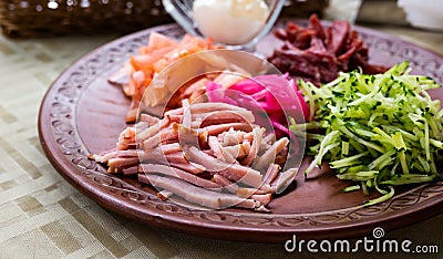 traditional Belarusian salad of vegetables and bacon. salad Paparats kvetka Stock Photo