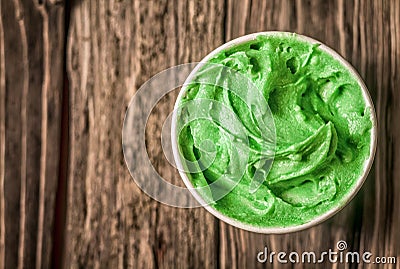 Appetizing tub of green Italian ice cream Stock Photo