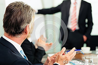 Applause for a presentation in meeting Stock Photo