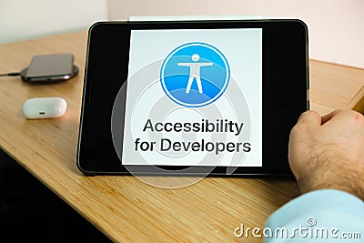 Apple accessibility for developers logo on the screen of iPad tablet. March 2021, San Francisco, USA Editorial Stock Photo