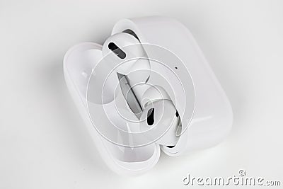 Apple AirPods Pro on a white background. Editorial Stock Photo