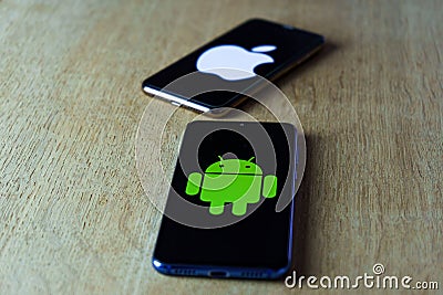 Apple and android smartphones. Iphone IOS versus Android operating system Editorial Stock Photo